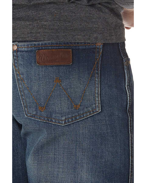 Image #7 - Wrangler Men's Retro Relaxed Fit Mid Rise Boot Cut Jeans, Indigo, hi-res