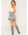 Image #3 - Ashley Women's Buckle Pleated Denim Mini Skort, Light Blue, hi-res