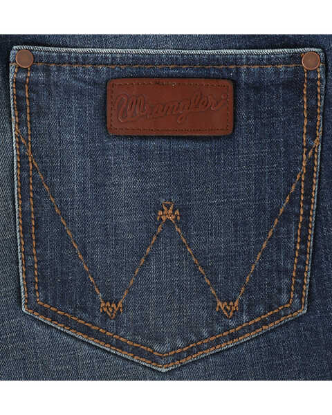 Image #8 - Wrangler Men's Retro Relaxed Fit Mid Rise Boot Cut Jeans, Indigo, hi-res